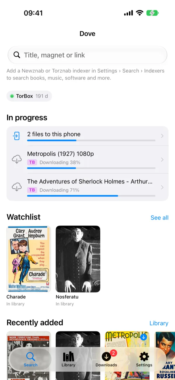 Dove on an iPhone: the Search tab with downloads in progress and the watchlist